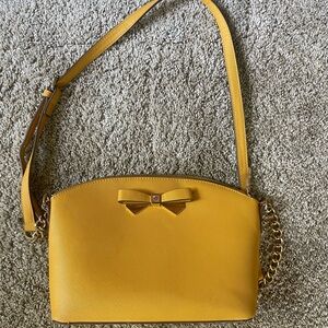 Yellow Anne Klein purse.